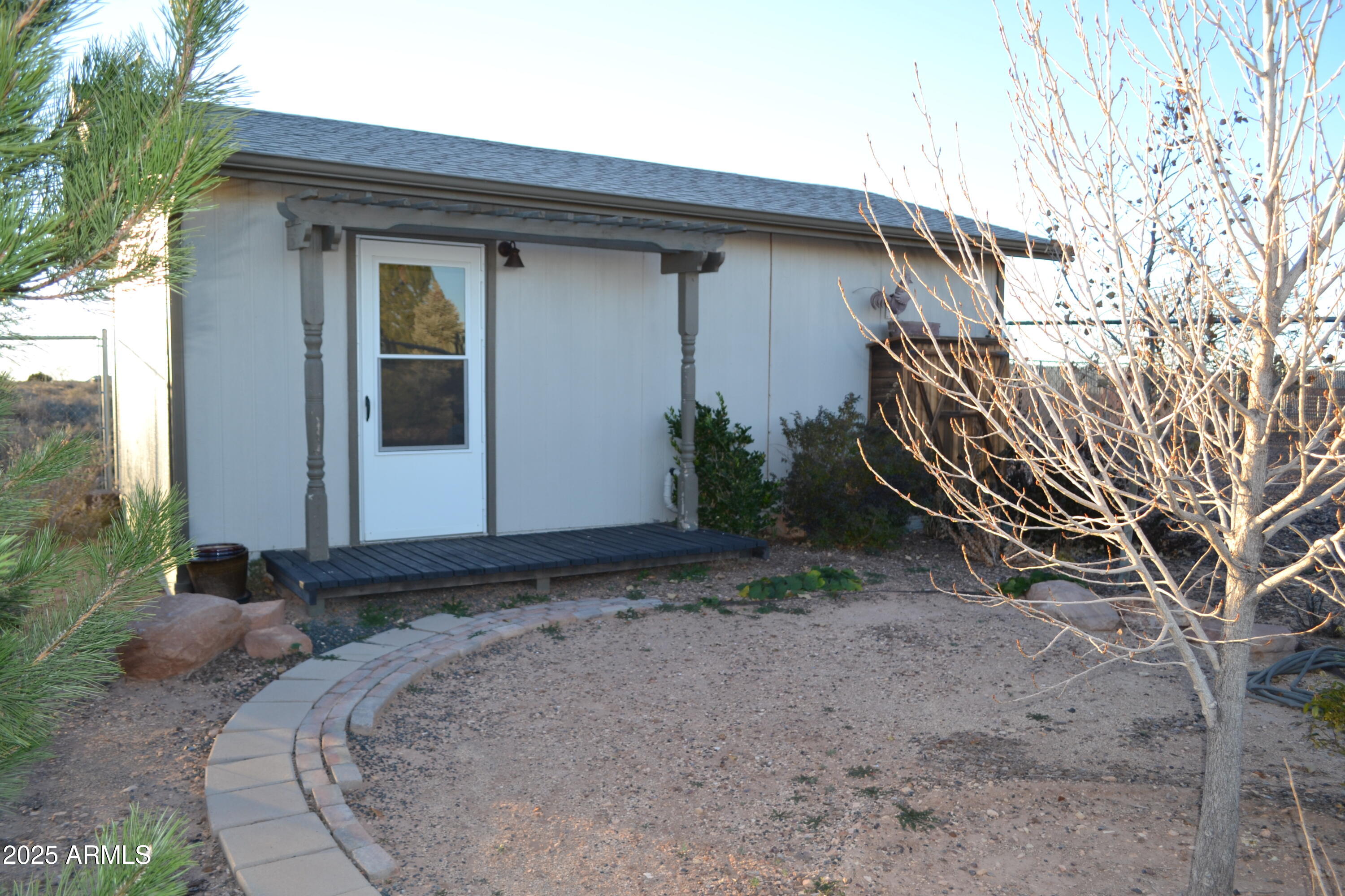 656 Sundown Drive Snowflake, AZ 85937 - Photo 20 of 29 a view of a house with a yard