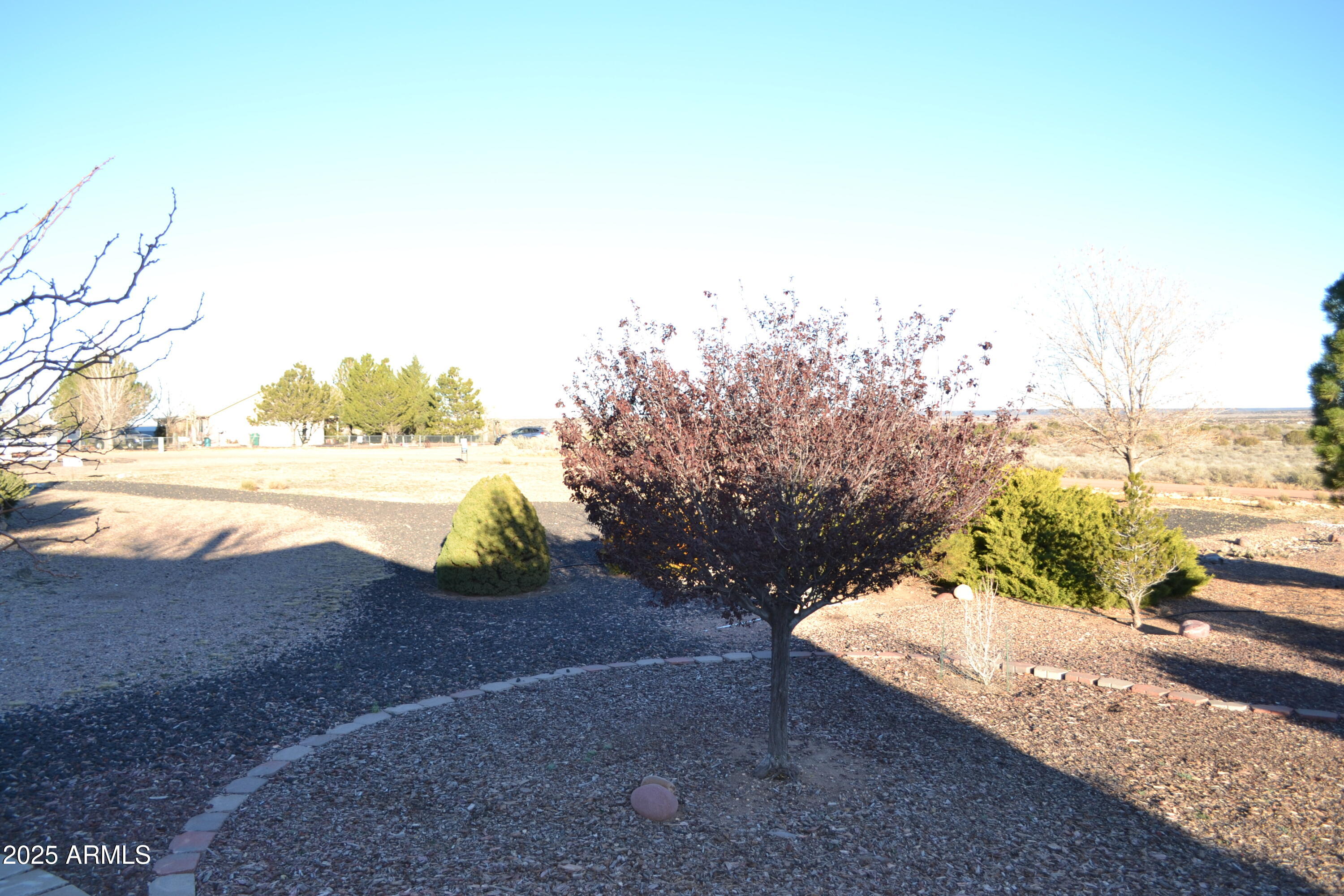 656 Sundown Drive Snowflake, AZ 85937 - Photo 24 of 29 a view of a yard with an ocean view
