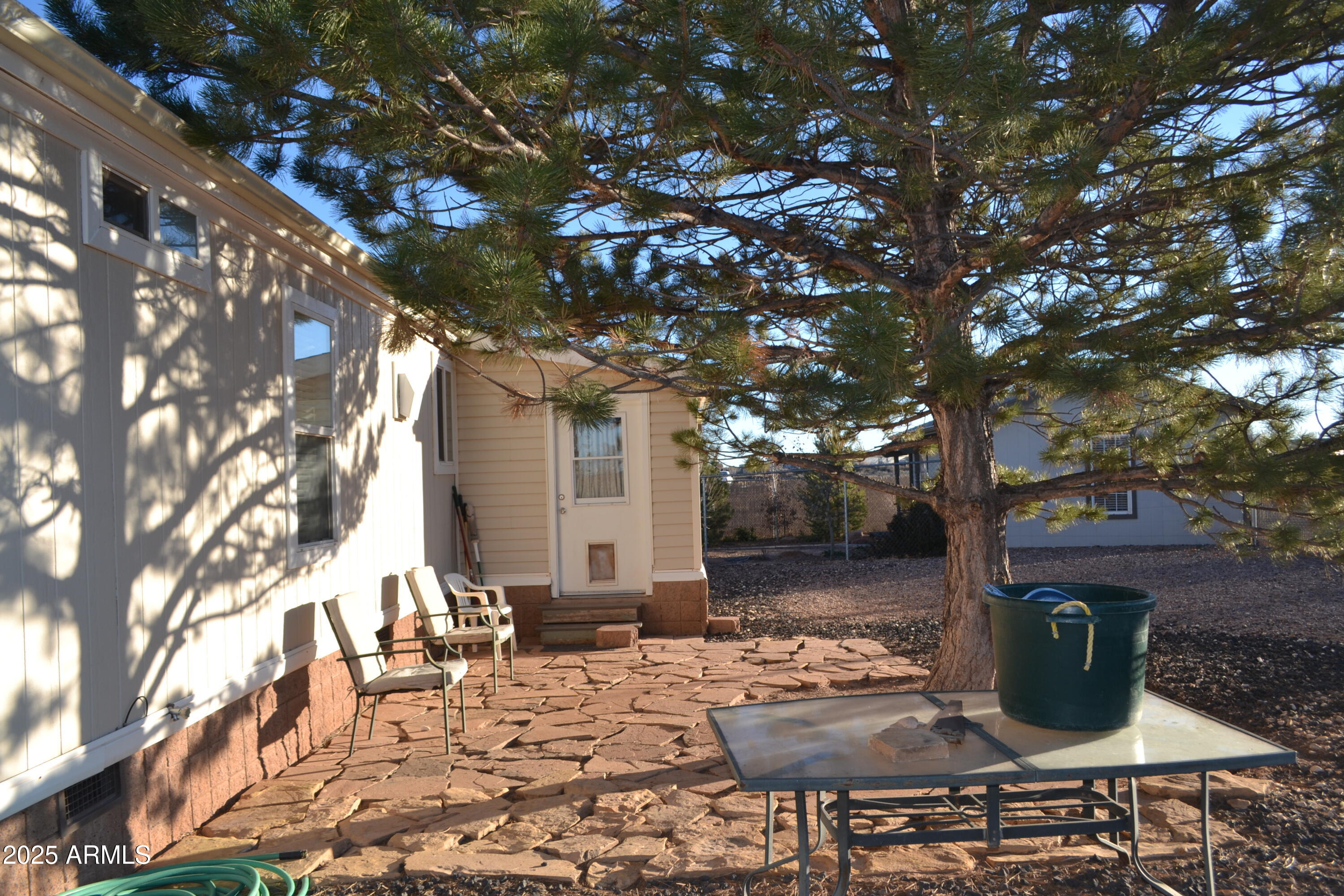 656 Sundown Drive Snowflake, AZ 85937 - Photo 29 of 29 a view of a chairs and table in backyard