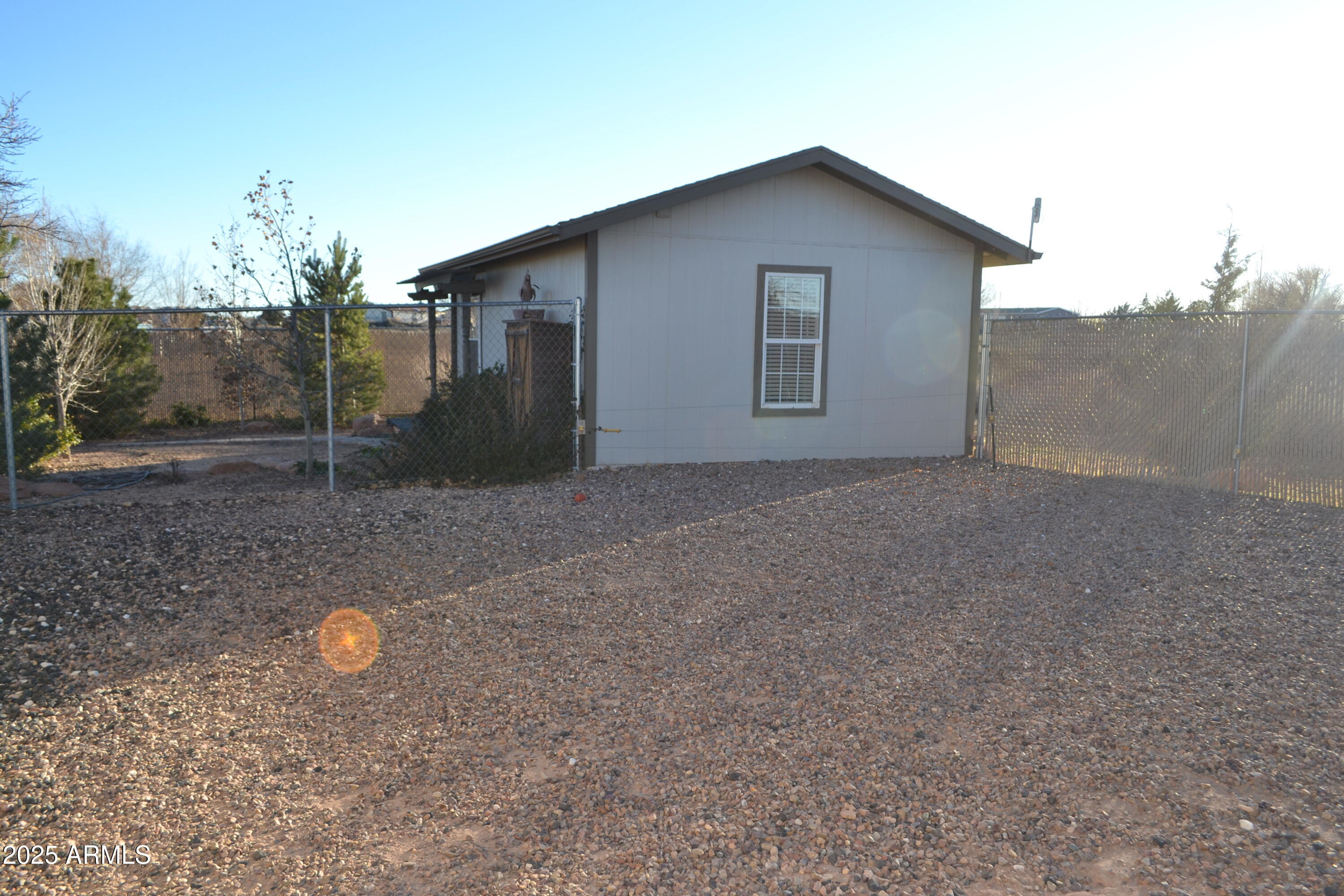 656 Sundown Drive Snowflake, AZ 85937 - Photo 8 of 29 a backyard of a house with lots of green space