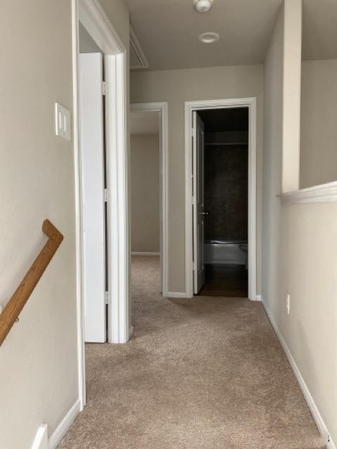 9210 Wood Beach Way Houston, TX 77034 - Photo 10 of 17 an empty room with closet and a hallway