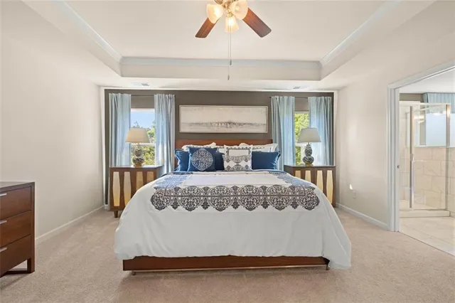 a bathroom with a double vanity sink mirror and shower