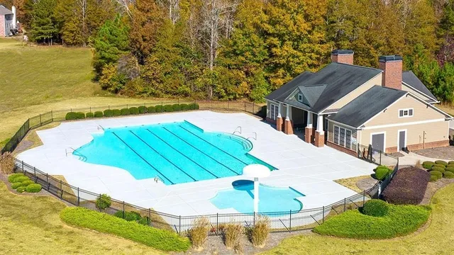 a view of a swimming pool with an outdoor space