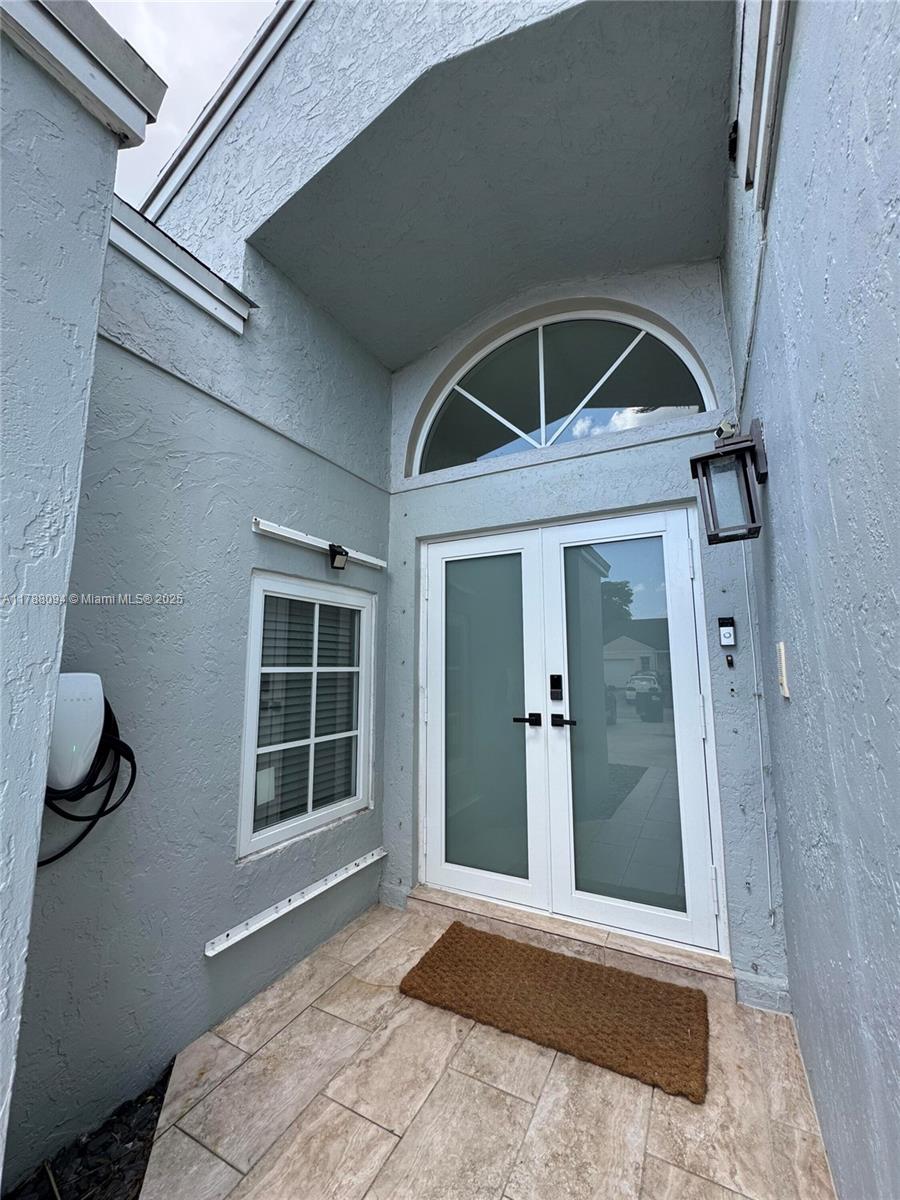 14626 Southwest 128th Court Road Miami, FL 33186 - Photo 3 of 41 a view of front door