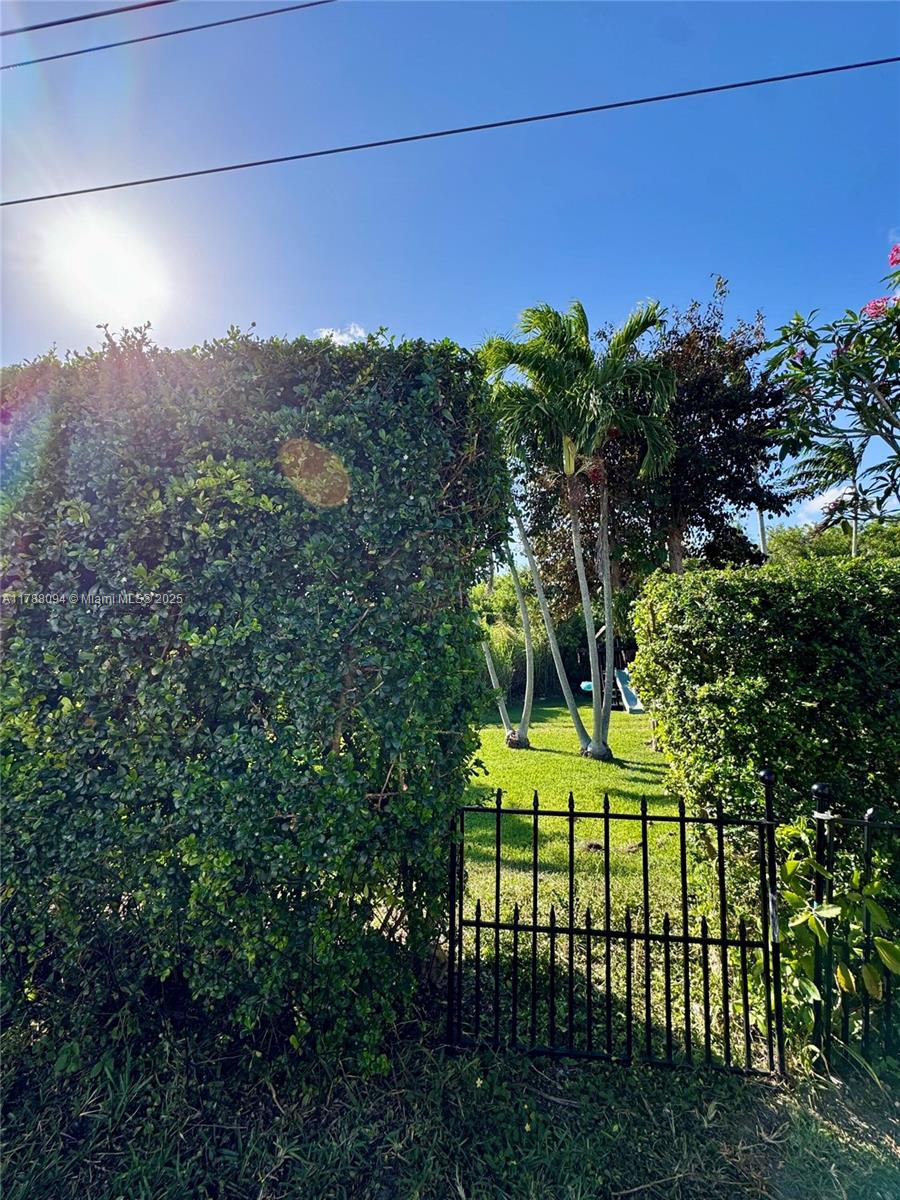 14626 Southwest 128th Court Road Miami, FL 33186 - Photo 40 of 41 a view of a backyard