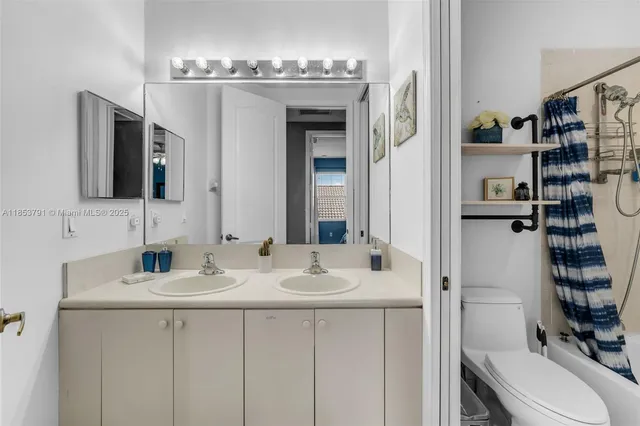 a room with furniture and white walls