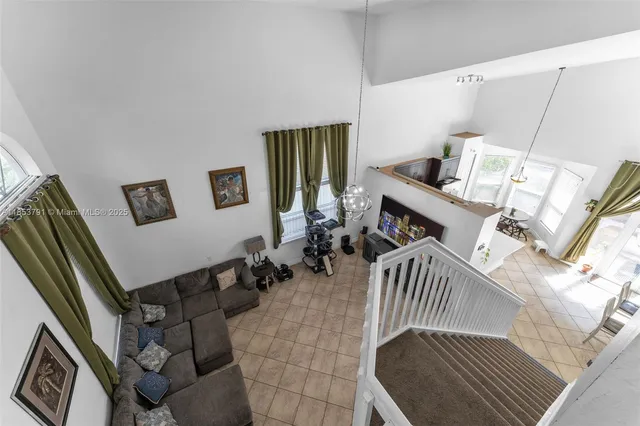 a bathroom with a sink mirror and toilet