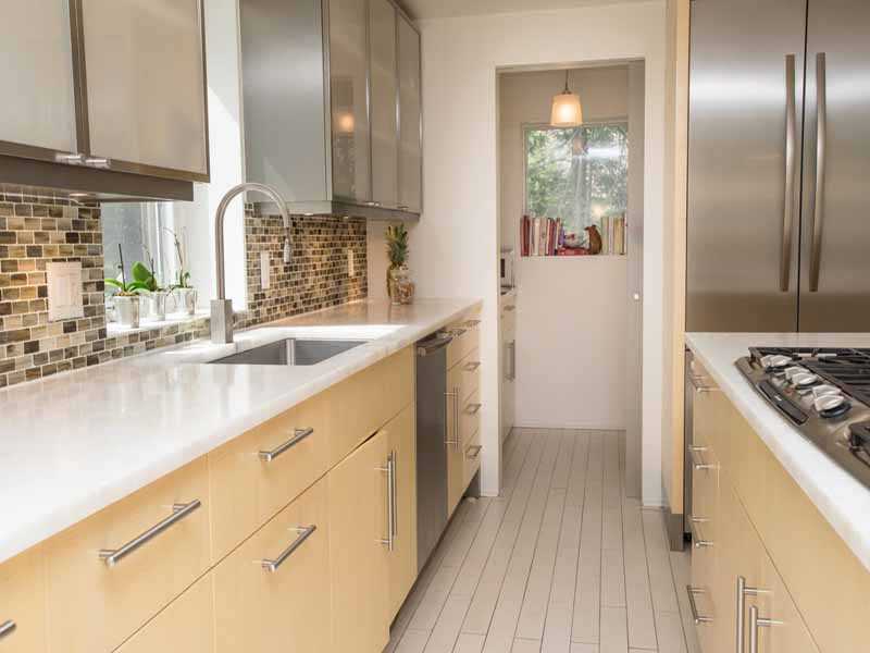 614 Hollow Tree Ridge Road Darien, CT 06820 - Photo 11 of 21 a kitchen with granite countertop a sink stove and refrigerator