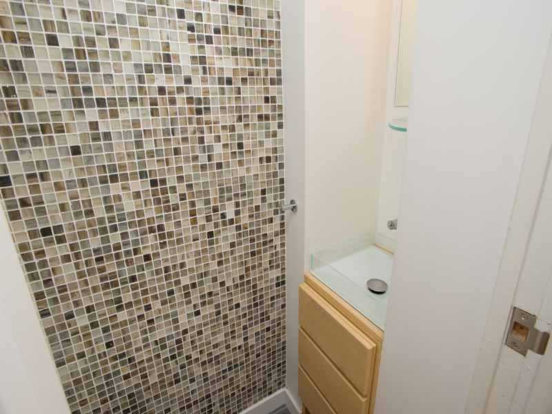 614 Hollow Tree Ridge Road Darien, CT 06820 - Photo 20 of 21 a bathroom with a shower and a sink