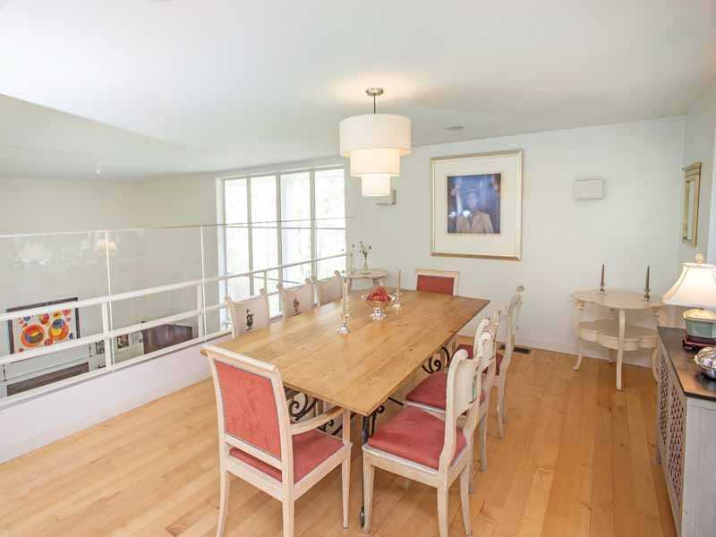 614 Hollow Tree Ridge Road Darien, CT 06820 - Photo 9 of 21 a view of a dining room with furniture and window