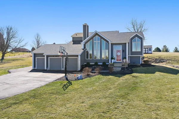 a house view with a swimming pool