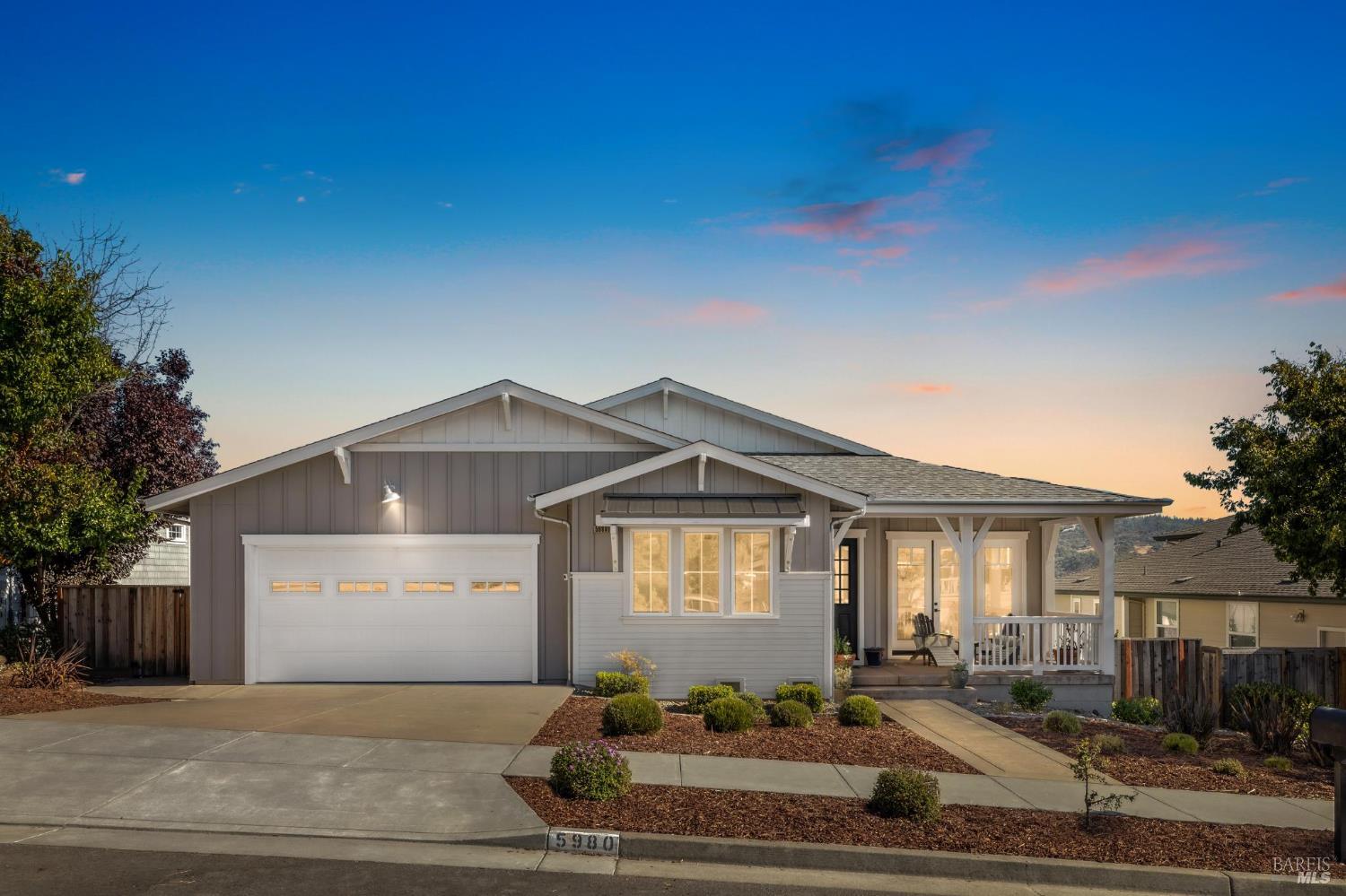 5980 Vista Ridge Santa Rosa, CA 95409 - Photo 1 of 63 a front view of a house with a garden