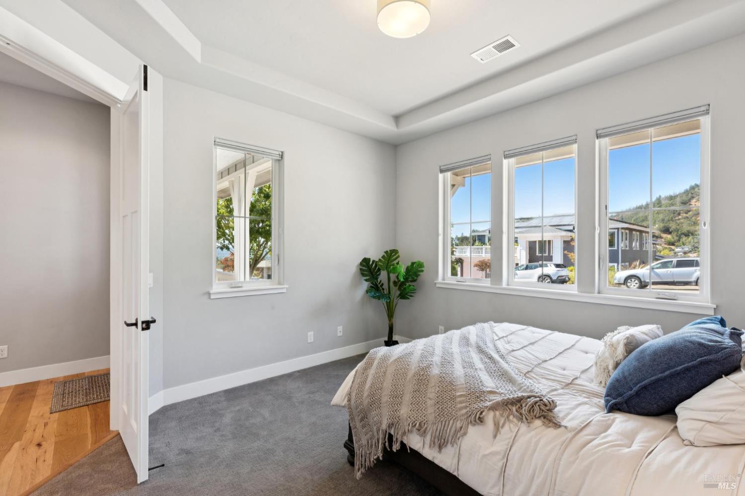 5980 Vista Ridge Santa Rosa, CA 95409 - Photo 11 of 63 a bed sitting in a bedroom next to a window