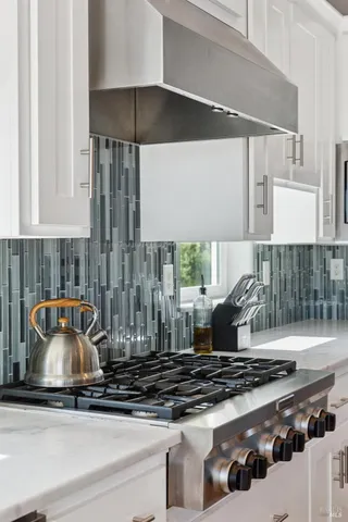 a bedroom with bed and a couch