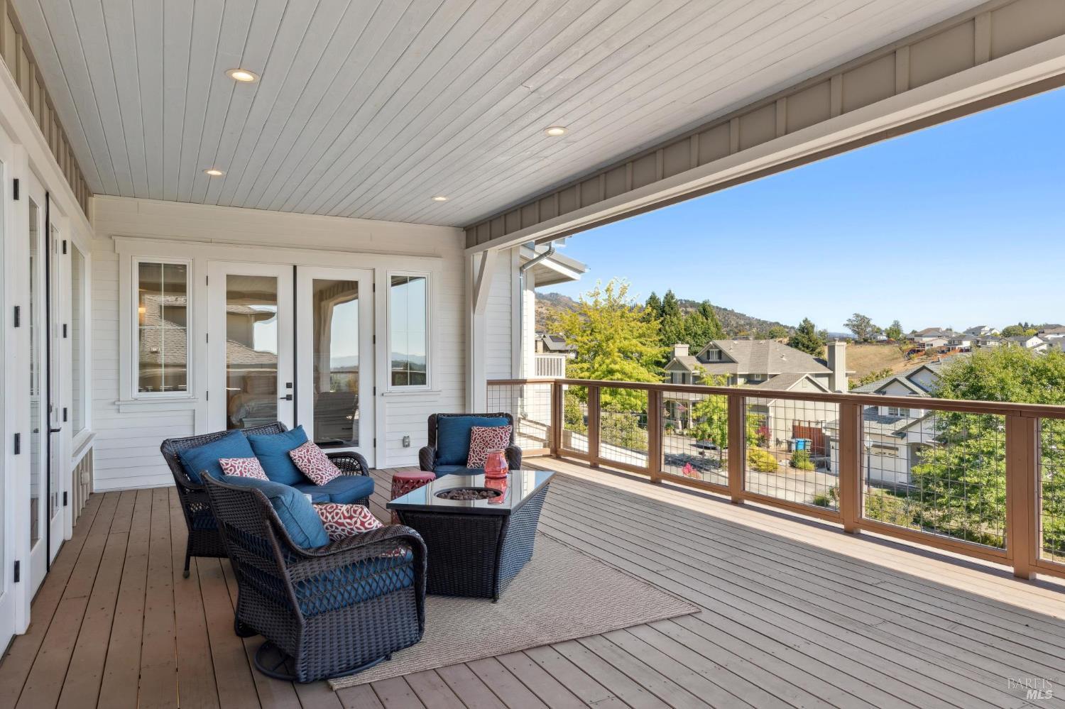 5980 Vista Ridge Santa Rosa, CA 95409 - Photo 30 of 63 a living room with furniture and a floor to ceiling window