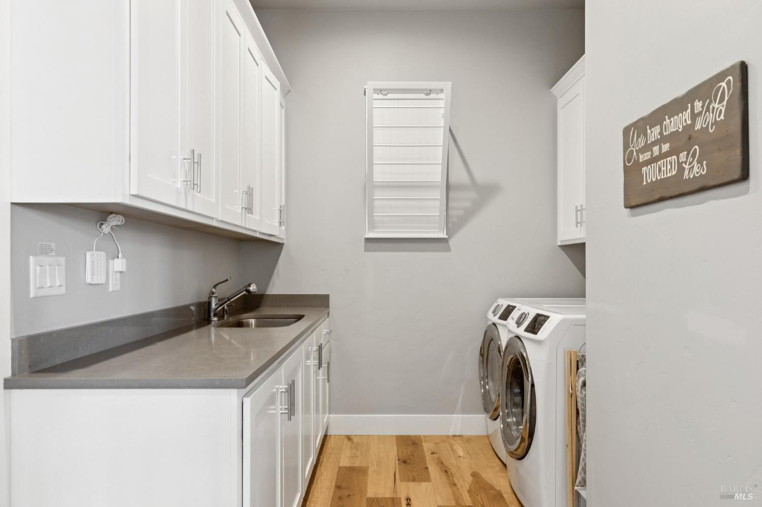 5980 Vista Ridge Santa Rosa, CA 95409 - Photo 32 of 63 a utility room with sink dryer and washer