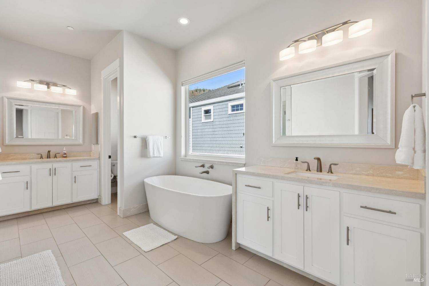 5980 Vista Ridge Santa Rosa, CA 95409 - Photo 37 of 63 a spacious bathroom with a double vanity sink mirror and bathtub