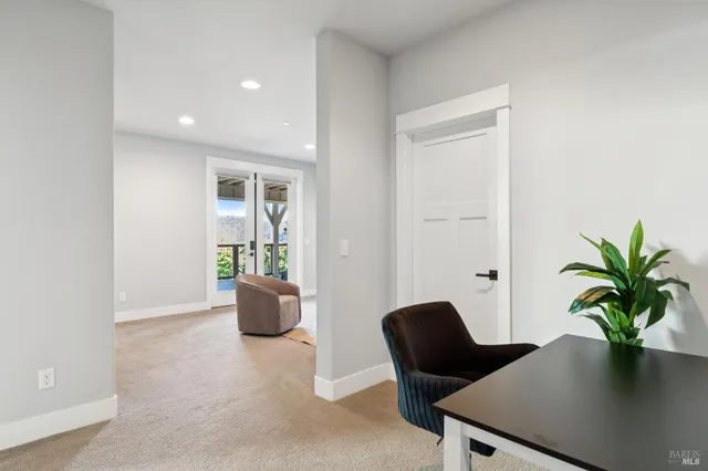 a view of a balcony with wooden floor