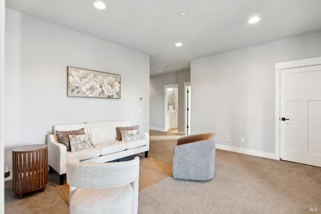 a bedroom with a bed and a view of bedroom