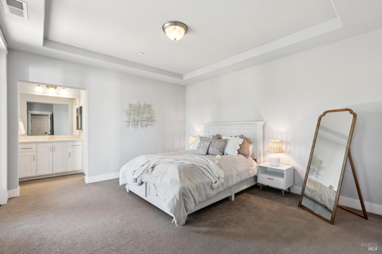 5980 Vista Ridge Santa Rosa, CA 95409 - Photo 46 of 63 a bedroom with a bed a rug and a chair