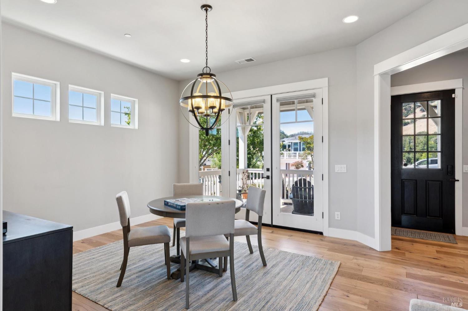 5980 Vista Ridge Santa Rosa, CA 95409 - Photo 9 of 63 a view of a dining room with furniture window and wooden floor
