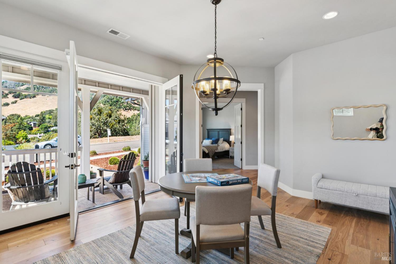 5980 Vista Ridge Santa Rosa, CA 95409 - Photo 10 of 63 a view of a dining room with furniture window and wooden floor