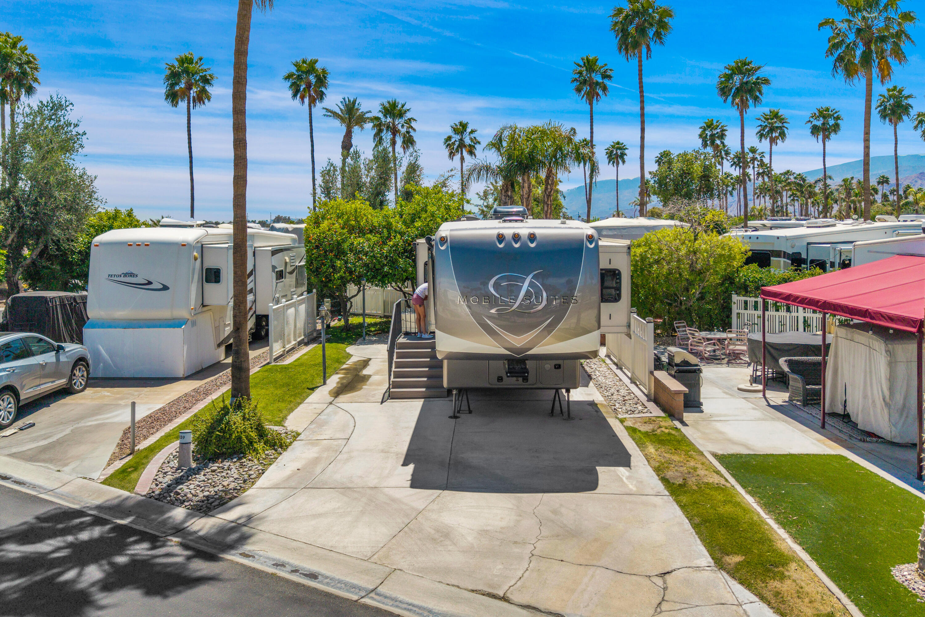 69411 Ramon Road, Unit 839 Cathedral City, CA 92234 - Photo 13 of 50 a view of a swimming pool with a patio