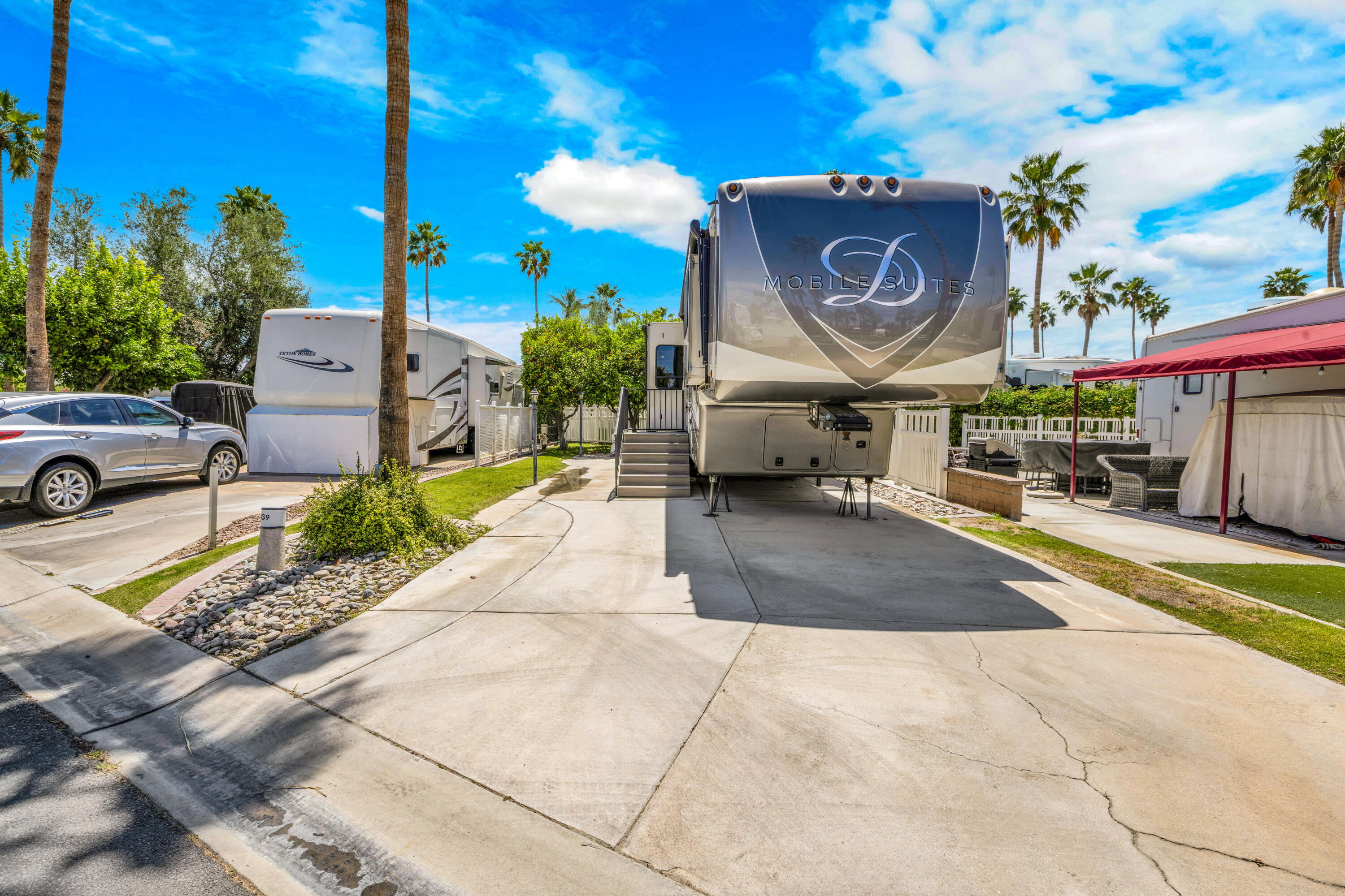 69411 Ramon Road, Unit 839 Cathedral City, CA 92234 - Photo 2 of 50 a view of a fountain with potted plants