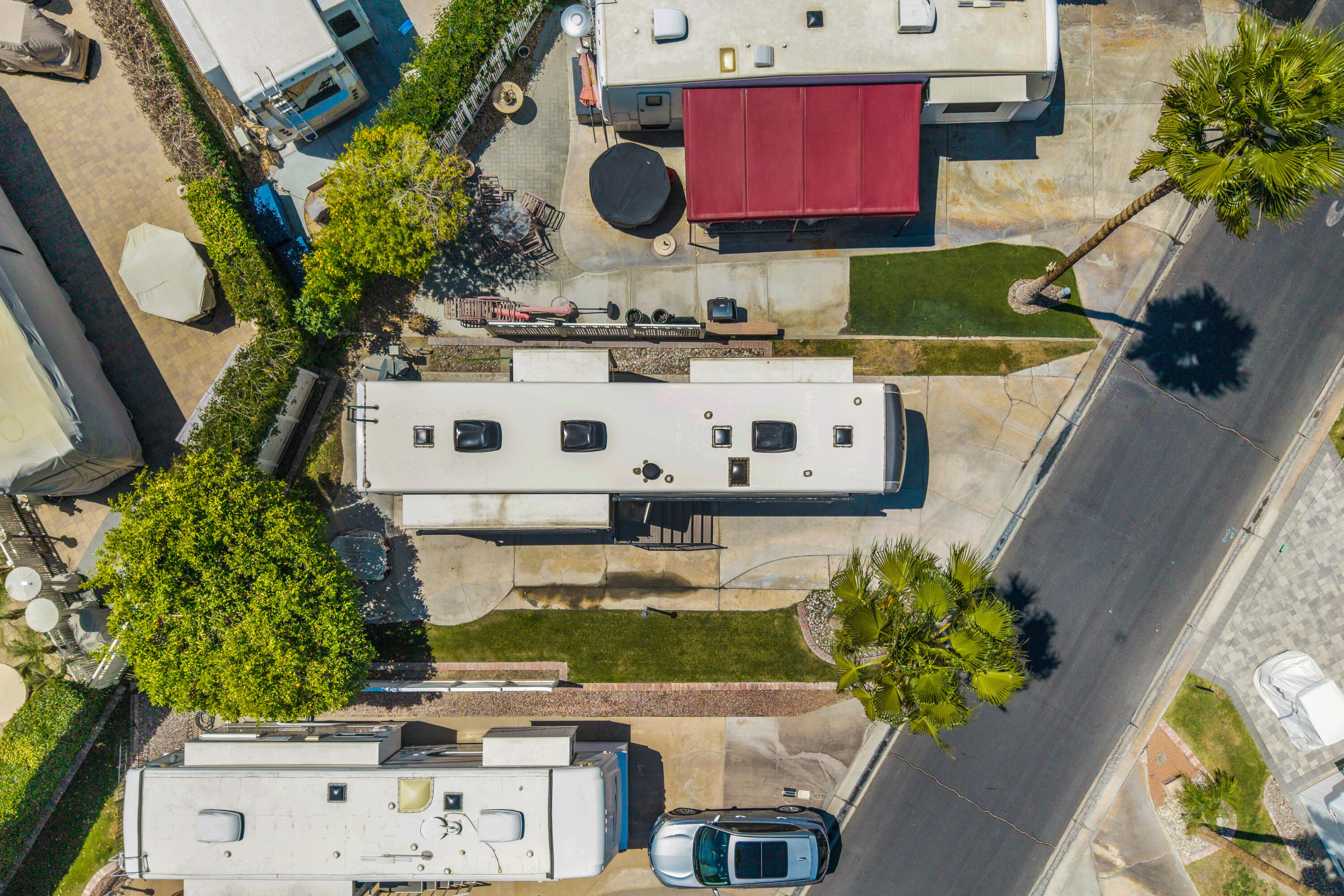 69411 Ramon Road, Unit 839 Cathedral City, CA 92234 - Photo 5 of 50 an aerial view of a house with a yard swimming pool and outdoor seating