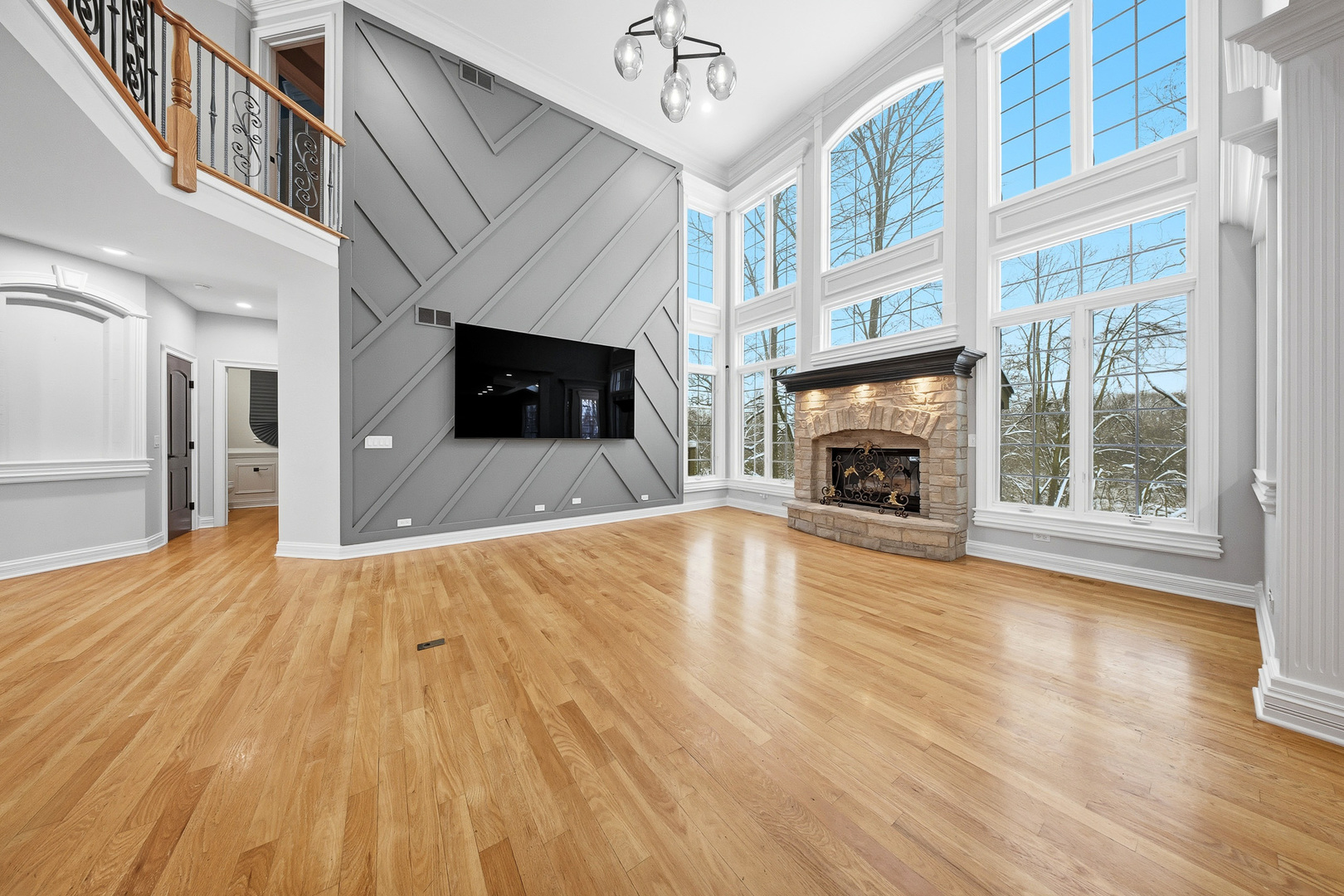 761 Reserve Court South Elgin, IL 60177 - Photo 14 of 89 a view of an empty room with wooden floor fireplace and a window