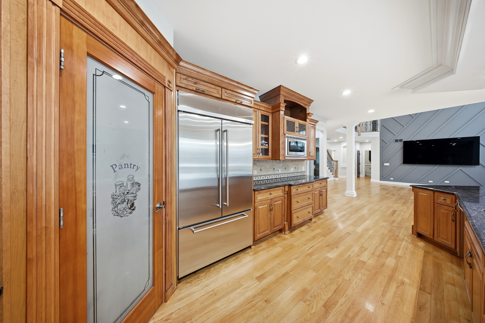 761 Reserve Court South Elgin, IL 60177 - Photo 18 of 89 a large kitchen with stainless steel appliances a refrigerator and a stove top oven