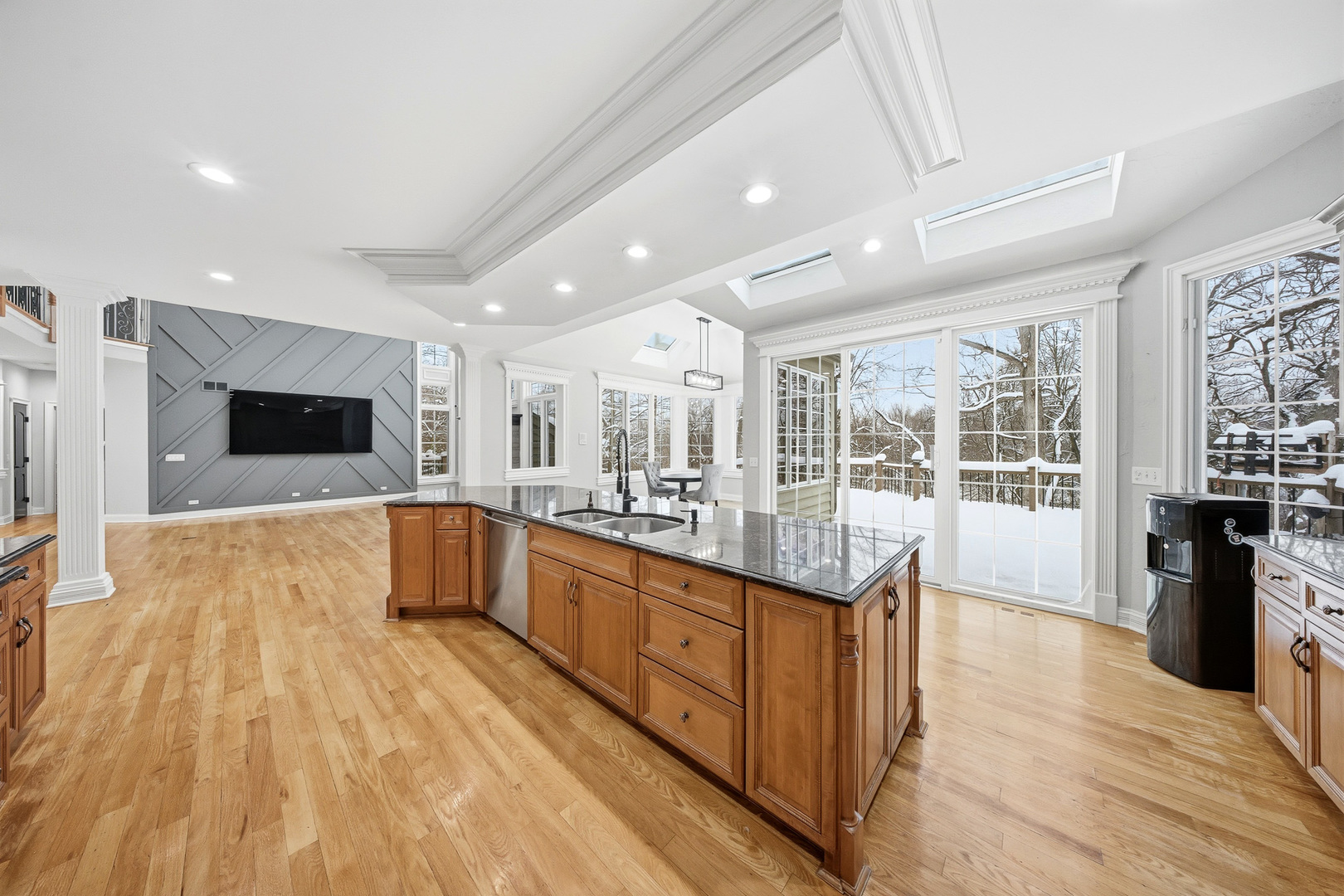 761 Reserve Court South Elgin, IL 60177 - Photo 19 of 89 a large kitchen with stainless steel appliances granite countertop a large counter top a stove and a wooden floors