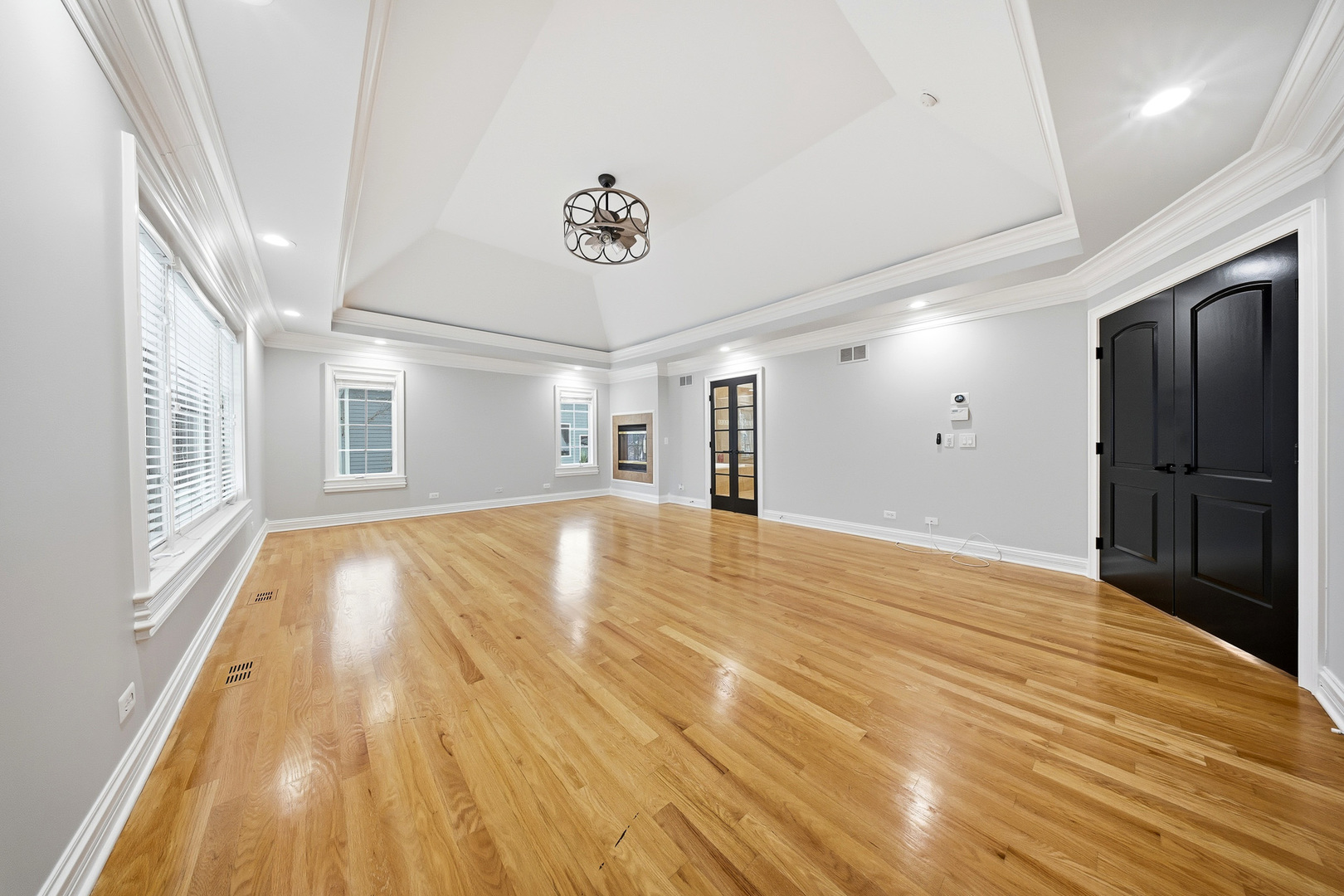761 Reserve Court South Elgin, IL 60177 - Photo 33 of 89 a view of an empty room with wooden floor and a window