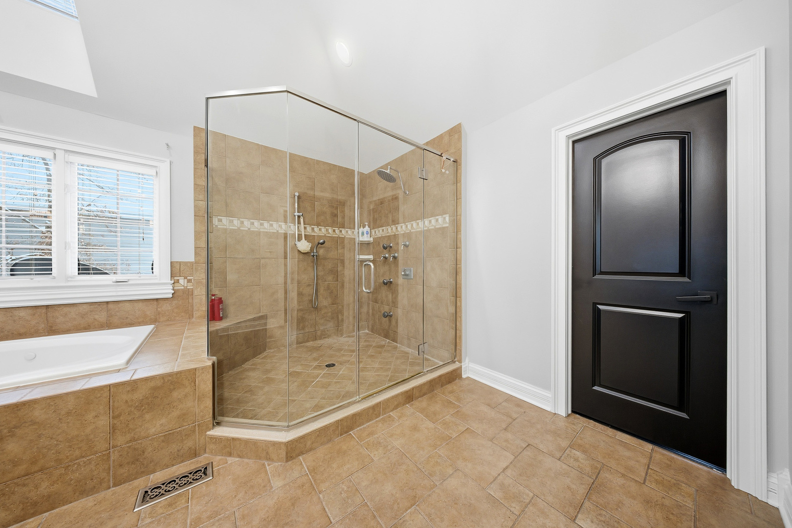 761 Reserve Court South Elgin, IL 60177 - Photo 37 of 89 a bathroom with a bathtub and a shower