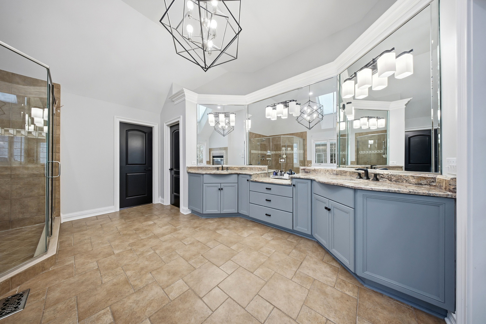 761 Reserve Court South Elgin, IL 60177 - Photo 43 of 89 a large bathroom with a sink a large mirror and a shower