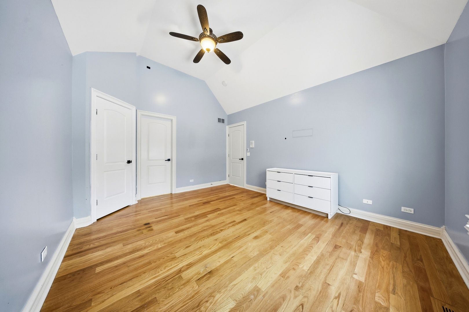 761 Reserve Court South Elgin, IL 60177 - Photo 47 of 89 a bedroom with a bed and a chandelier