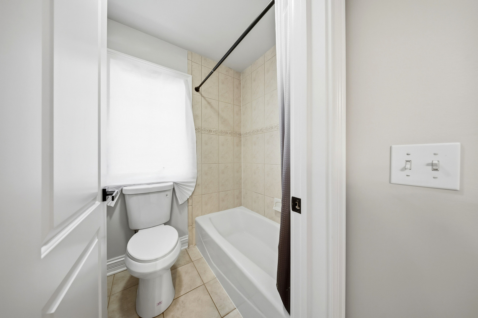 761 Reserve Court South Elgin, IL 60177 - Photo 49 of 89 a white toilet sitting next to a bathroom sink