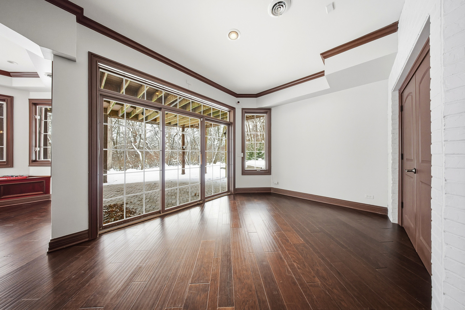 761 Reserve Court South Elgin, IL 60177 - Photo 62 of 89 a view of an entryway with wooden floor and windows