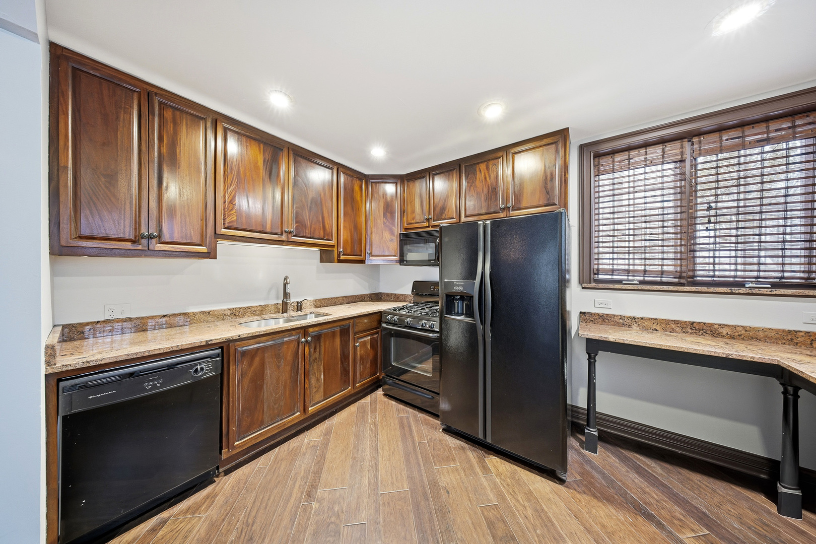 761 Reserve Court South Elgin, IL 60177 - Photo 67 of 89 a kitchen with granite countertop stainless steel appliances and wooden cabinets