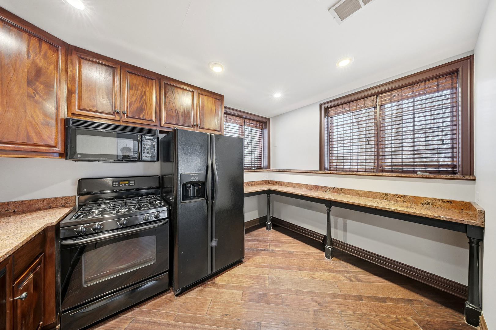 761 Reserve Court South Elgin, IL 60177 - Photo 68 of 89 a kitchen with stainless steel appliances granite countertop a stove and a refrigerator