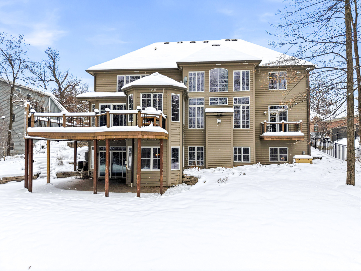 761 Reserve Court South Elgin, IL 60177 - Photo 80 of 89 a front view of a building with a table and chairs