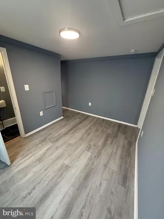 a view of a livingroom with wooden floor