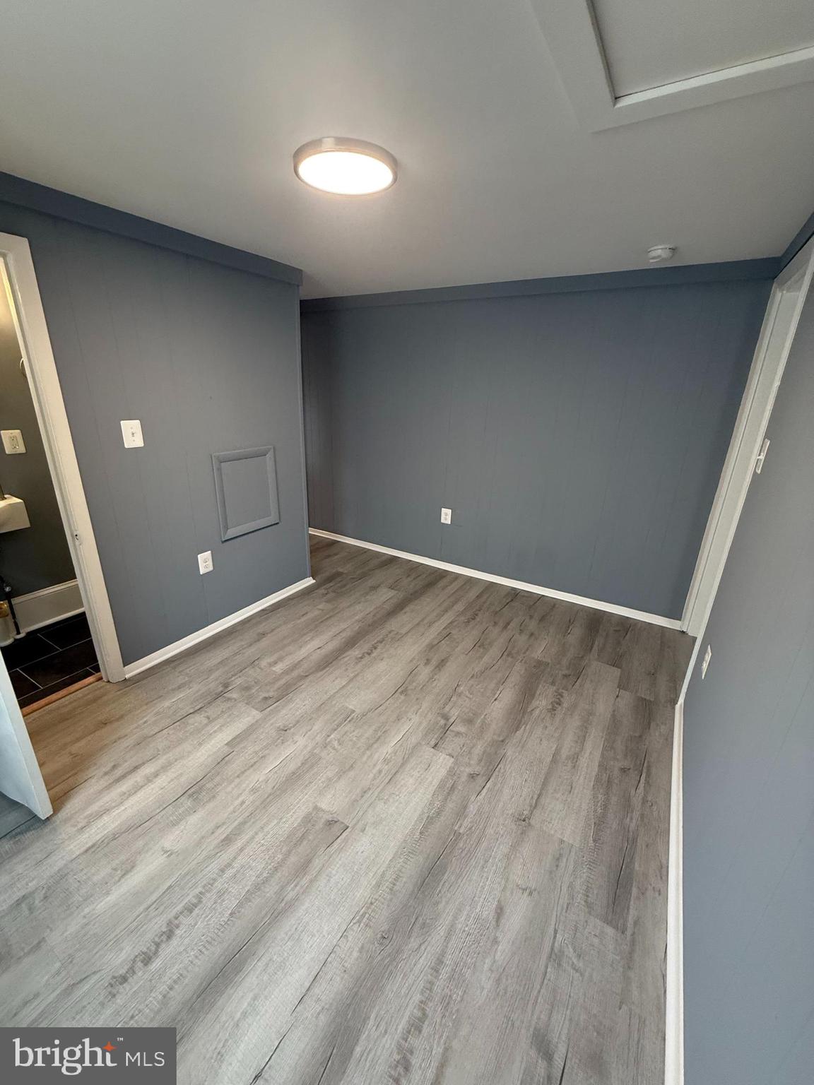 122 West All Saints Street Frederick, MD 21701 - Photo 17 of 23 a view of a livingroom with wooden floor
