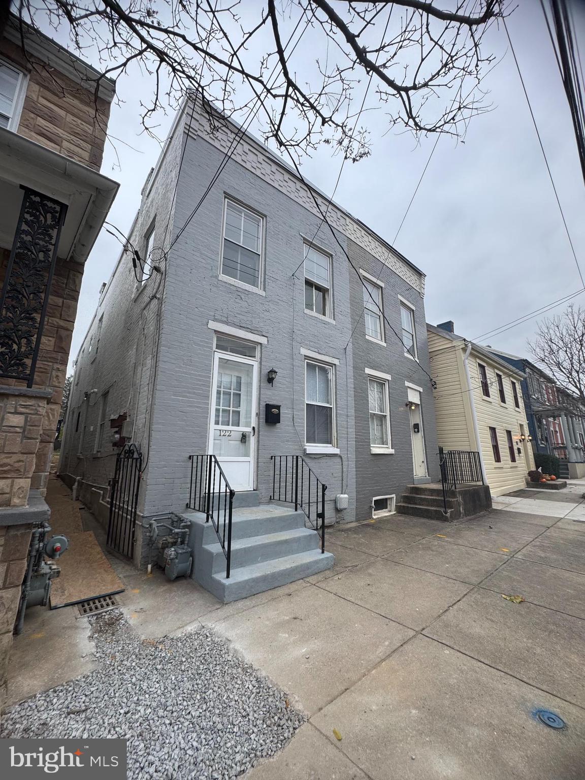 122 West All Saints Street Frederick, MD 21701 - Photo 2 of 23 a view of a building with a bench