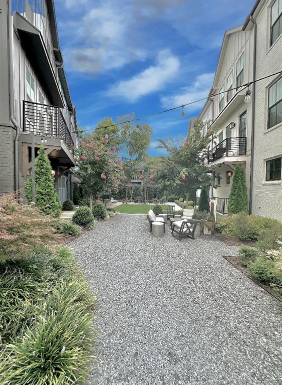 192 Chestnut Circle Atlanta, GA 30342 - Photo 14 of 16 a view of a house with a yard