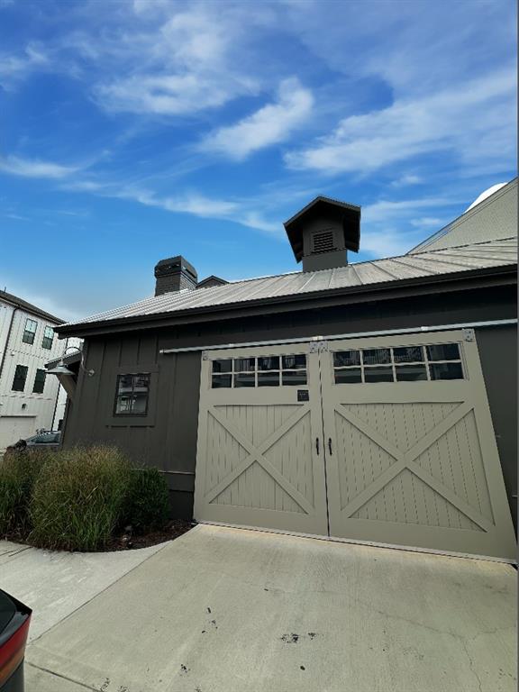 192 Chestnut Circle Atlanta, GA 30342 - Photo 15 of 16 a front view of a house with garage