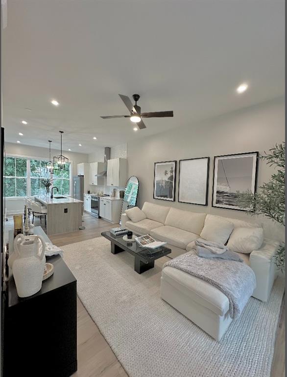 192 Chestnut Circle Atlanta, GA 30342 - Photo 5 of 16 a living room with furniture and a large window