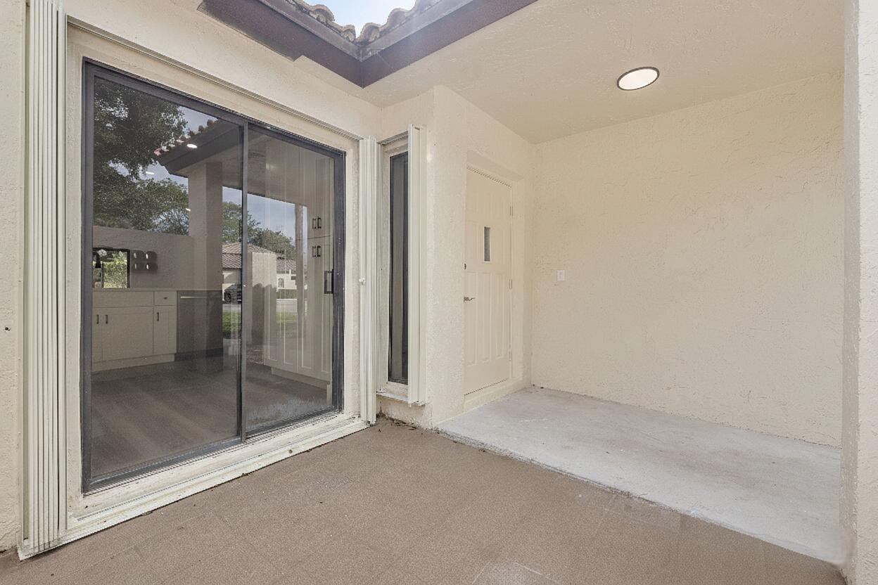 3127 Kingswood Terrace Boca Raton, FL 33431 - Photo 19 of 29 Front Patio