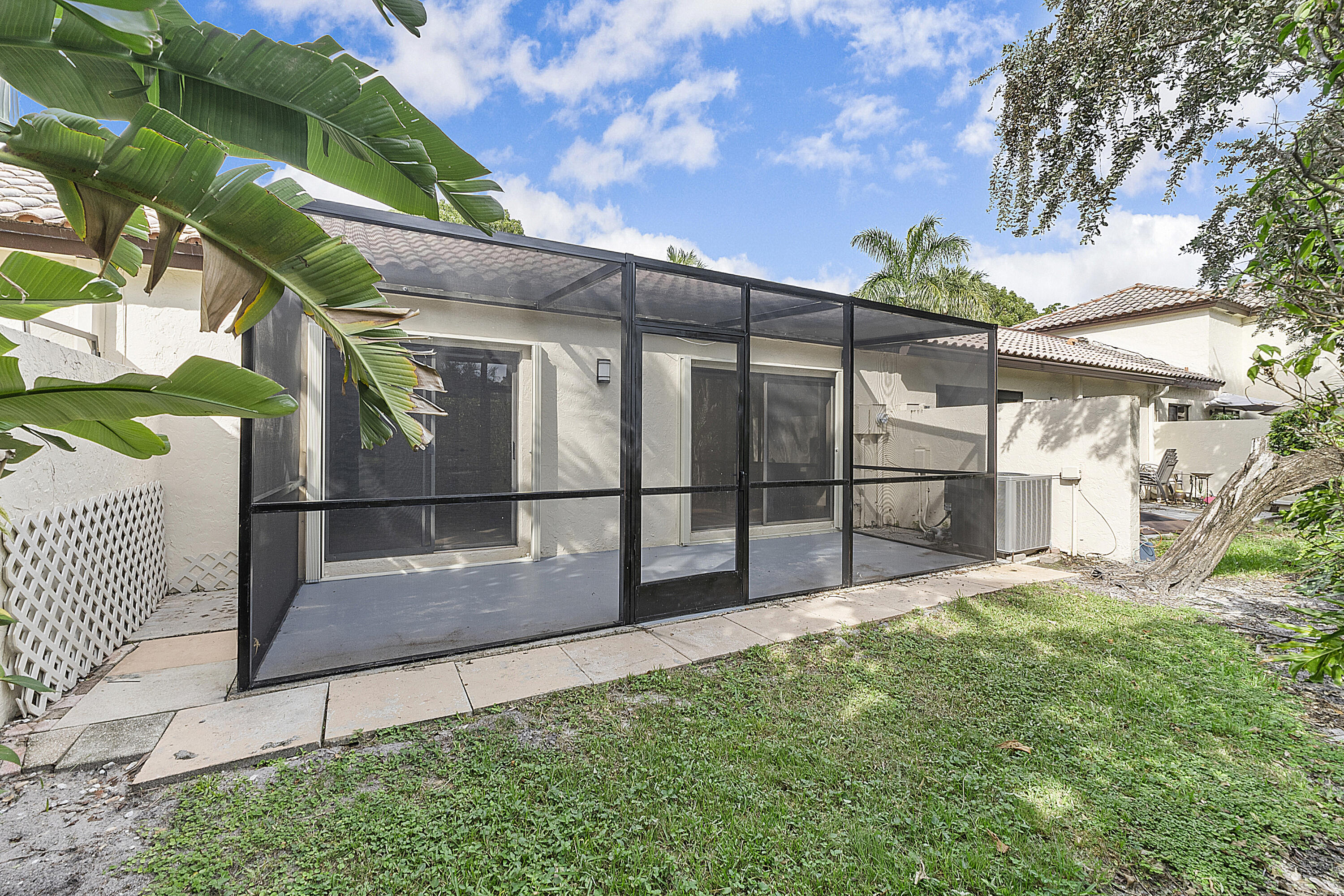 3127 Kingswood Terrace Boca Raton, FL 33431 - Photo 21 of 29 Back Screened Patio