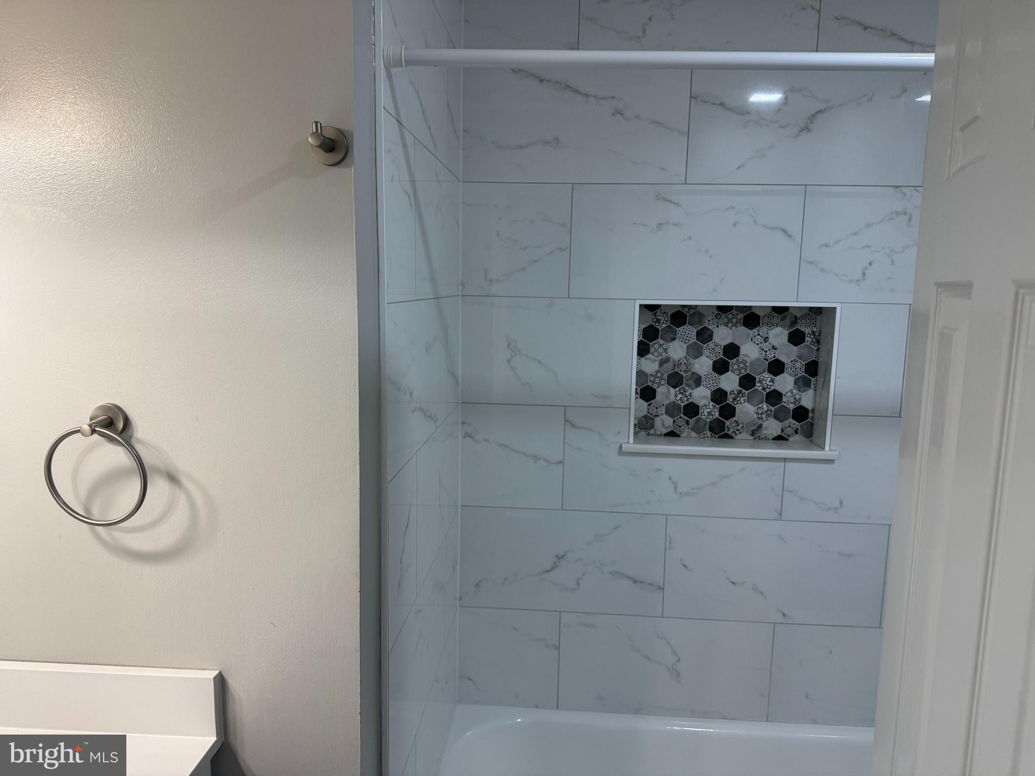 6110 George Baylor Drive Centreville, VA 20121 - Photo 11 of 12 a bathroom with a shower and tub